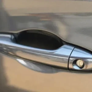 Here’s what it means if you spot a penny lodged in your car door handle