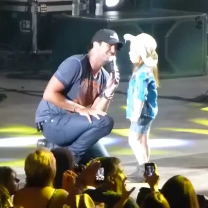 Luke Bryan Joined by Enthusiastic Young Fan Onstage Who Sings Along to Every Word!